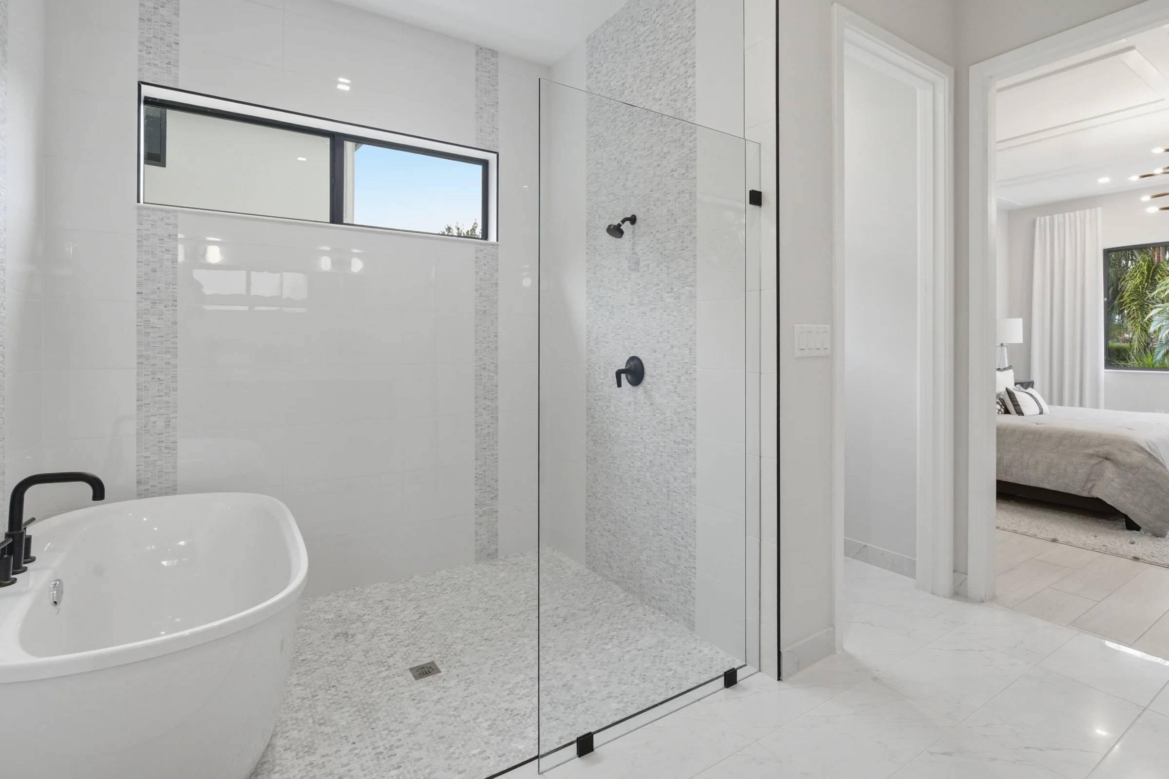 Primary bath with a freestanding tub and walk-in shower